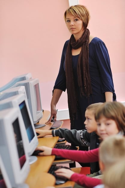 A teacher creatively interacting with students in a modern classroom, utilizing a large touch-screen display that subtly integrates AI-driven analytics and content suggestions, emphasizing their role as a facilitator.