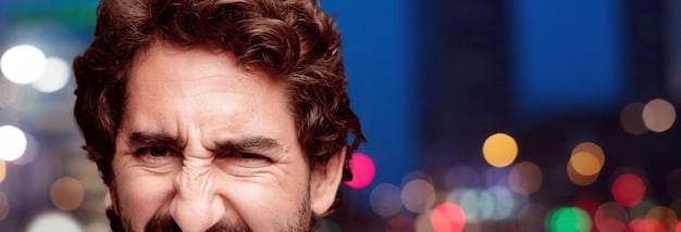 A detailed, close-up image of a distressed customer's face subtly blurred, with a focused human customer service agent offering compassionate assistance in the foreground, underscoring the irreplaceable value of human empathy in complex support situations.